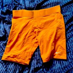 Orange Nike jogger shorts
